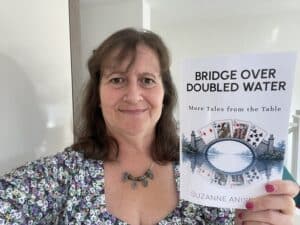 Suzanne is a self-published author, writing about life-lessons from bridge
